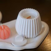 Striped pumpkin candle jar