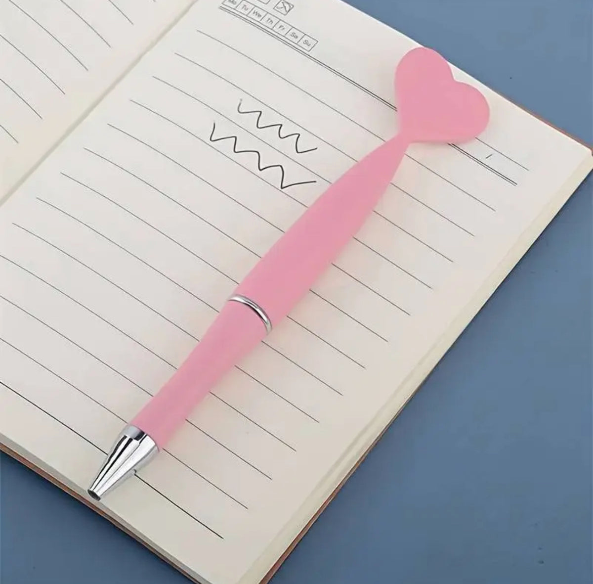 Pink heart pen